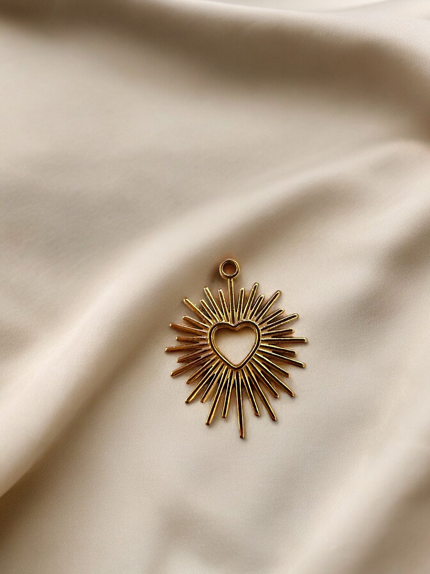 Radiant Heart Charm